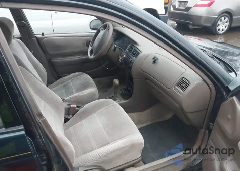 1997 Toyota Corolla Dx z USA, uszkodzony, nr VIN 2T1BB02E5VC199703